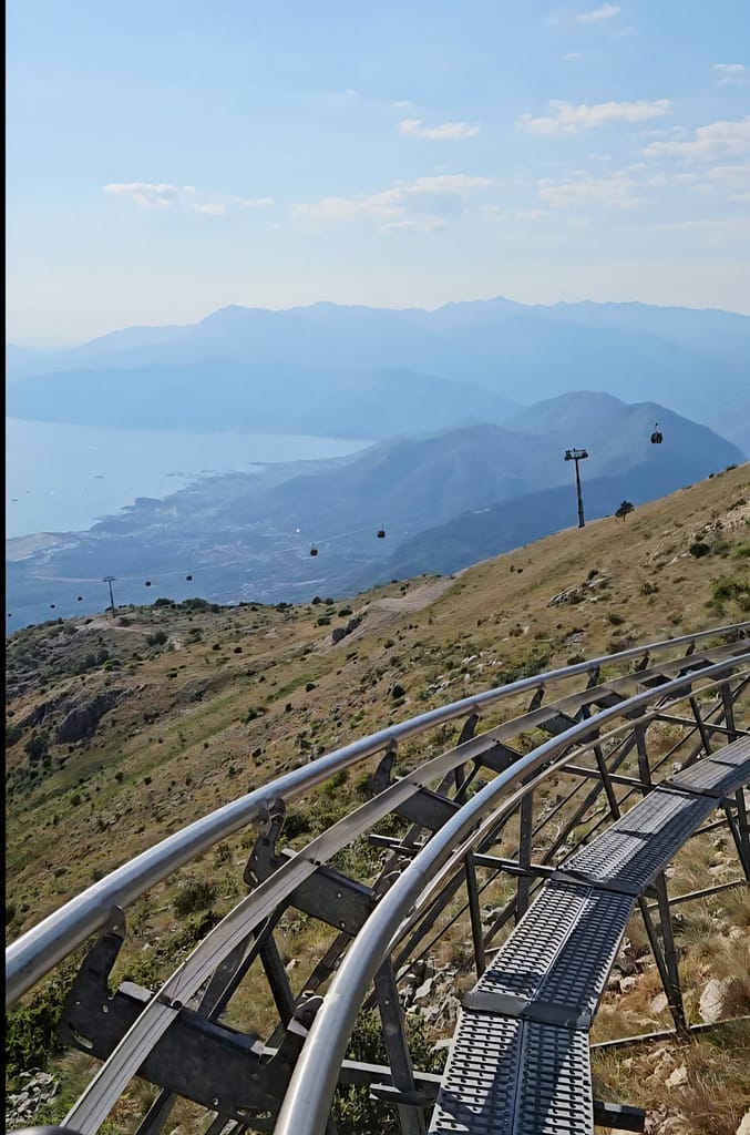 athe alpine coaster with view of the Bay of Kotor